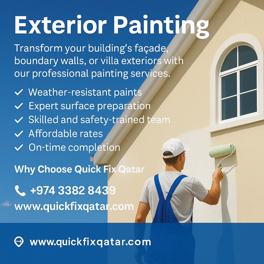 Professional exterior painter applying weatherproof coating on a villa wall in Qatar.